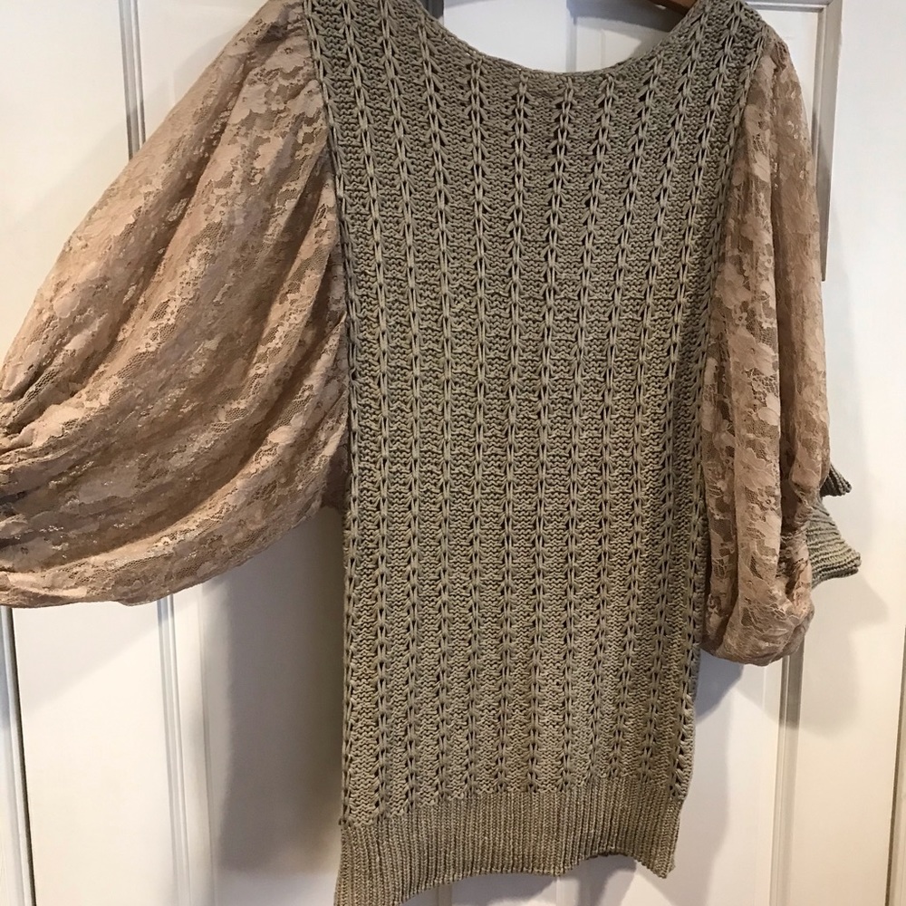 Sweater with nice details.